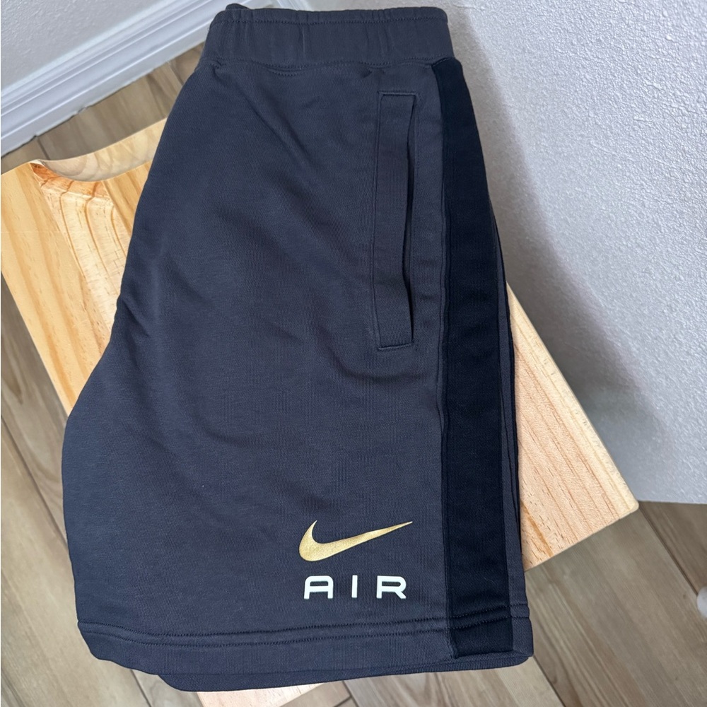 Nike Black Shorts with Gold Swoosh